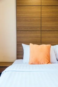 Comfortable pillow on bed Stock Photos