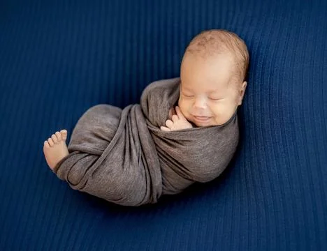 Comfortable pose of newborn Stock Photos