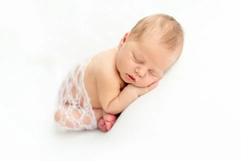 Comfortable pose for newborn Stock Photos