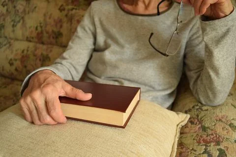 Comfortable reading of a book at home Stock Photos