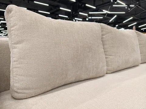 A comfortable settee with large cushions, available for purchase in the fur.. Stock Photos