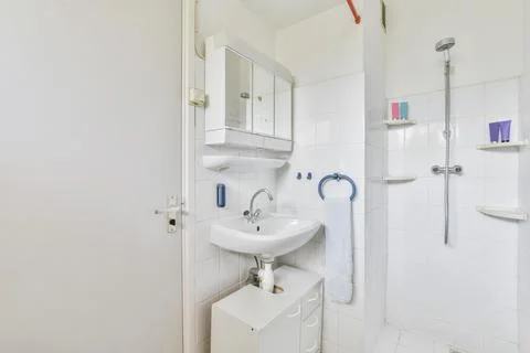 Comfortable snow-white bathroom Stock Photos