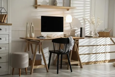 Comfortable workplace with computer in home office Stock Photos