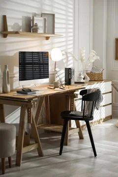 Comfortable workplace with computer in home office Stock Photos