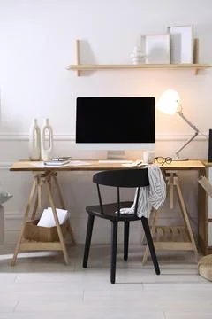 Comfortable workplace with computer in home office Stock Photos