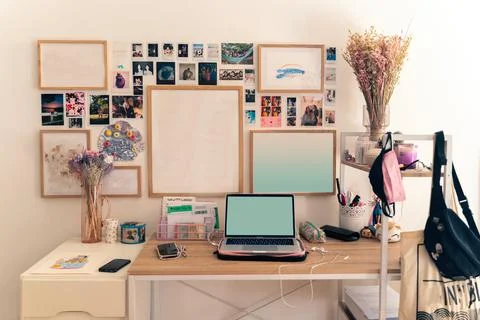 Comfortable workplace at home with pictures frames Stock Photos