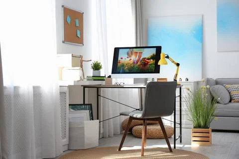 Comfortable workplace with modern computer on desk. Home office Stock Photos