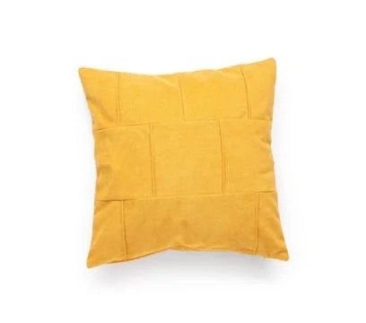 Comfortable yellow decorative throw pillow with textured fabric and geometric Stock Photos