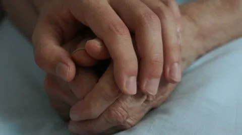Comforting Wrinkled Hands - Compassion for the Elderly Stock Footage