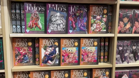 Comic books in library  Stock Footage 243063347