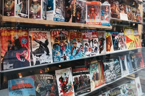 Comic books on a window retail display of Gosh! Comics shop in Covent Garden, Stock-Fotos