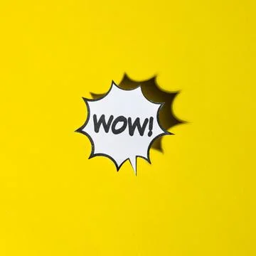 Comic cartoon speech bubble wow emotions yellow backdrop Stock Photos