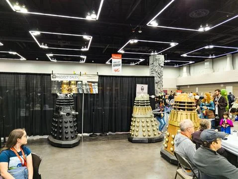 Comic Con Convention. People dressed in costumes of famous movie and cartoo.. Stock Photos