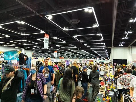 Comic Con Convention. People dressed in costumes of famous movie and cartoo.. Stock Photos