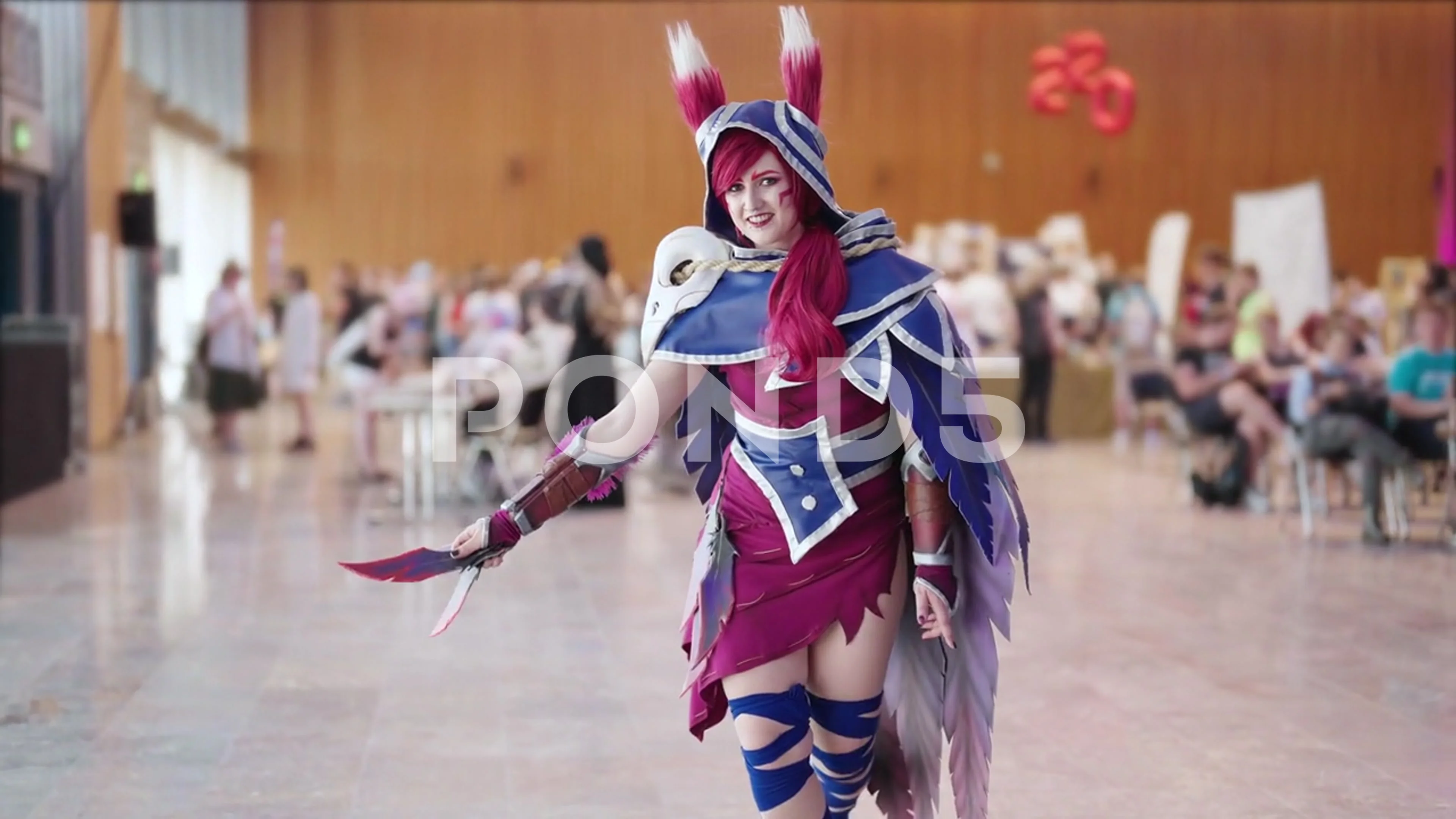 Comic con cosplay character Xayah from League of Legends game pose 4K