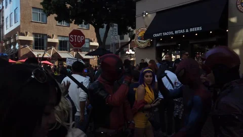 Comic Con SDCC 2019 - Deadpool, Spider-Man and Daredevil High Five Stock Footage 112942215
