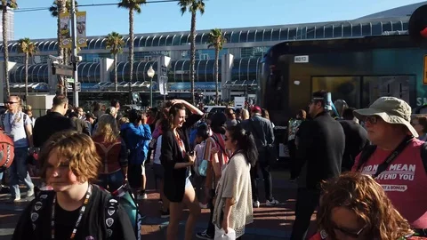 Comic Con SDCC 2019 - Jib Crane Up To Convention Center with Train passing Stock Footage 112942325