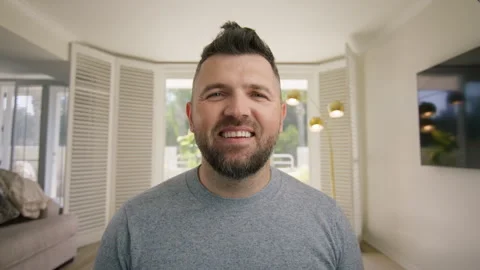 Comic guy finish video call, wave hand, sigh with relief and roll his eyes 4K 스톡 동영상 262694999