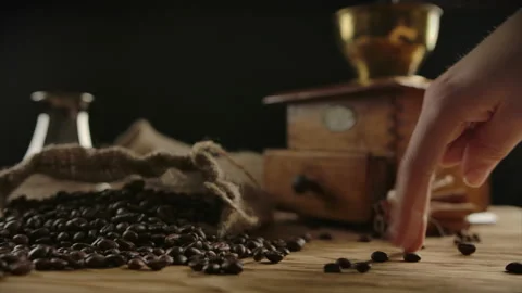 Comic human figure played by fingers walking over roasted coffee beans. Concept Stock Footage 140364904