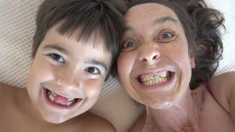 Comic mother and child show their teeth and yell Stock Footage 158592756