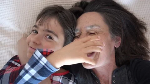 Comic mother and son fooling around Video stock 191808133
