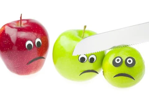 Comic still life of apples and limes with eyes isolated on white Stock Photos