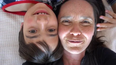 Comic video of son with mother and a han... | Stock Video | Pond5