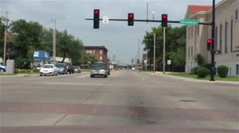 Comical and fast moving traffic at a stoplight 스톡 동영상 40544300