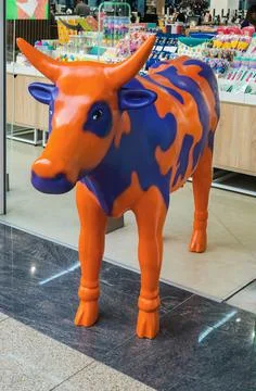 Comical cow made of plastic Stock Photos