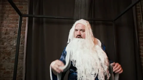 Comical crazy Santa Claus, Father Frost in blue costume takes shower, funny Stock Footage