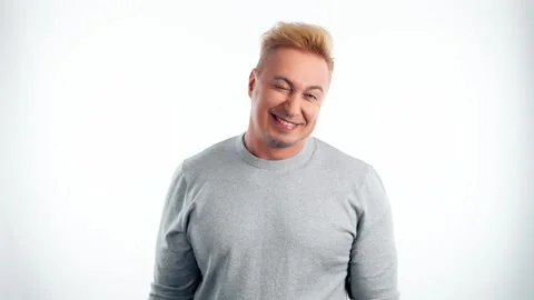 Comical funky man making fun silly facial expressions, fooling around. Caricatur Stock Footage 246428143