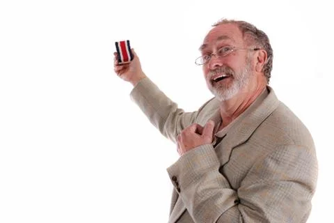 Comical professor gesturing with white board eraser Stock Photos