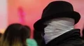 Comics character in mask and hat communicating with fans giving autographs HD Footage