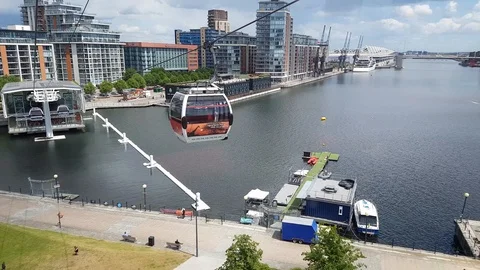 Coming in to dock on the Emirates Air Line over the Royal Docks, 4K Stock Footage 110456432