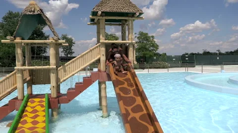 Coming down from the chute into the water Stock Footage 68075594