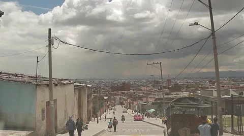 Coming down from poor mountainous locality of Ciudad Bolivar in Bogota Video stock 54937666