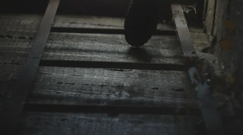 Coming down the stairs to the basement Stock Footage 68633124