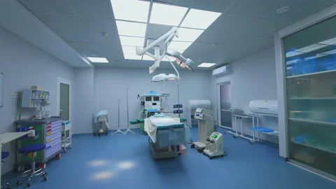 Coming into modern operating room. The light turns on in empty operating theater Stock Footage 152557214