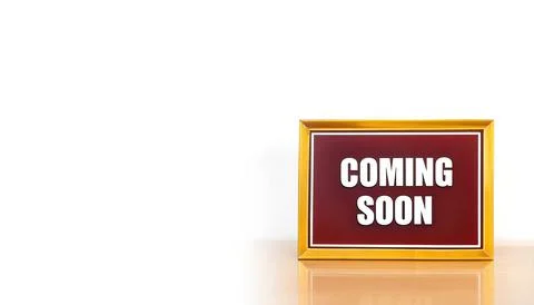 Coming soon words written on rectangle shape sign with white block letters... Stock Photos