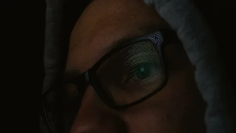 Command line is reflected in the programmer glasses close-up, 4k Stock Footage 87541681