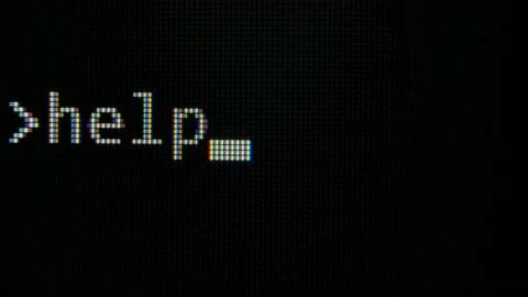 Command line with word Help and then format c typed on computer screen closeup Stock Footage 139860507