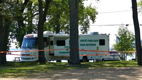 Command post caravan at crime scene Stock Footage 116104549