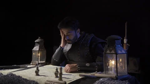 The commander playing with the locations of the stones on the map. Stock Footage 199473255