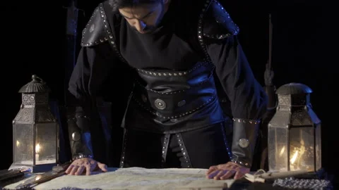 The commander who puts his hands on the table and makes a mark on the map. Stock Footage 199555885