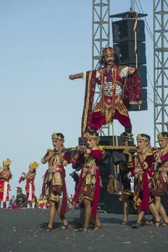 A commanding warlord stands high on a ceremonial stretcher Stock Photos
