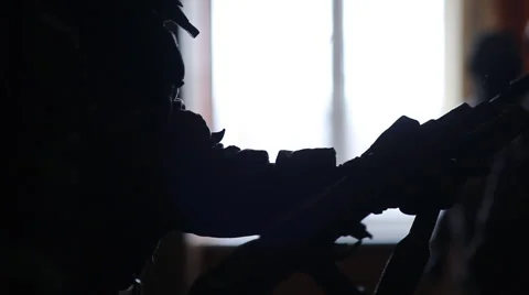 Commando charges  automatic rifle Stock Footage 48907362