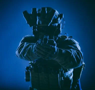 Commando fighter aiming service pistol in camera Stock Photos
