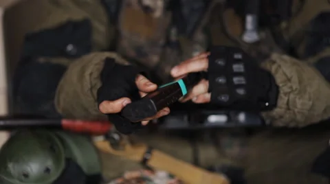 Commando hands of a holder of an automatic rifle Stock-Footage 48907370