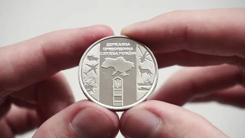 A commemorative coin in honor of the State Border Service of Ukraine Stock Footage 212116284
