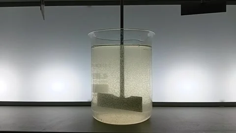 Commencement of Second Stage Slow Mixing in Jar Test - Advanced Flocculation Video stock 326168242